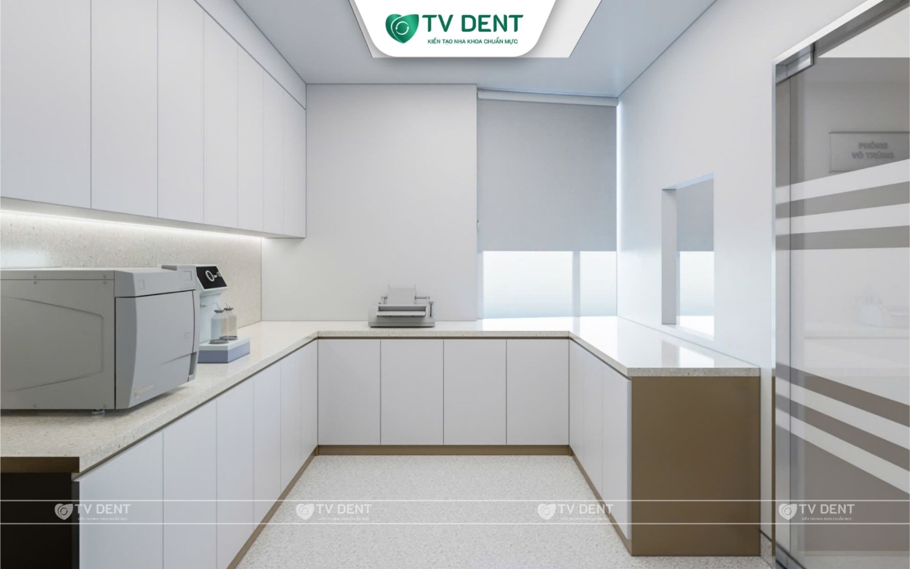 Góc tủ chữ L khu xử lý dụng cụ nha khoa với nồi hấp tiệt trùng, rèm cuốn và vách kính mờ tại Nha khoa Vạn Thành
